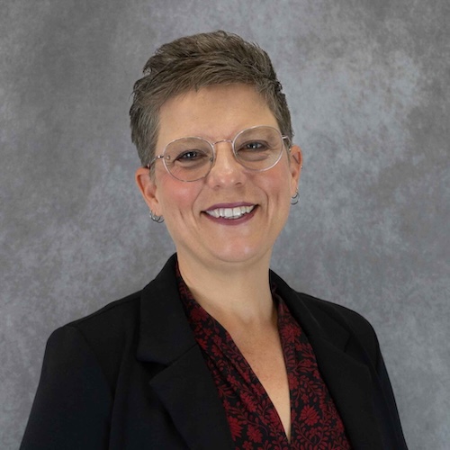 Portrait headshot: Sharon Woodill, Ph.D.